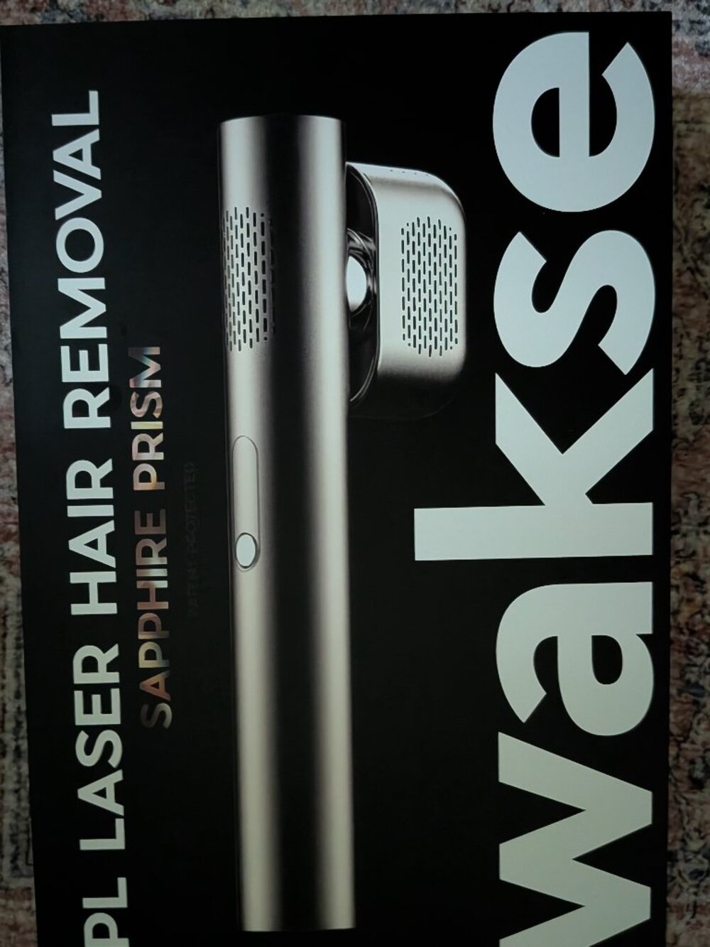 wakse laser hair removal device in box with glasses and cord